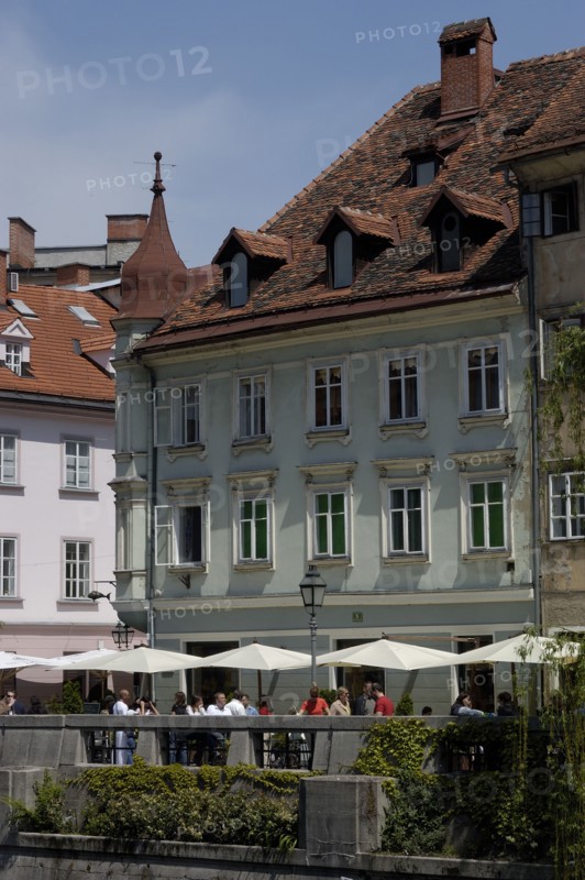 SLOVENIA, Ljubljana, River Ljubljanica. View of riverside cafe