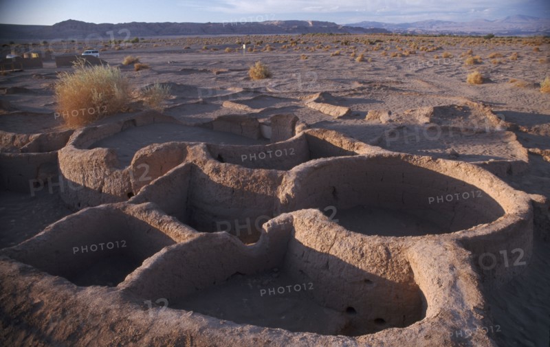 CHILE, Atacama Desert, Excavated village dwellings in desert landscape.