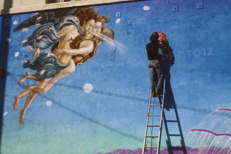 USA, California, Los Angeles, Painter working on mural based on Botticelli painting of Venus.