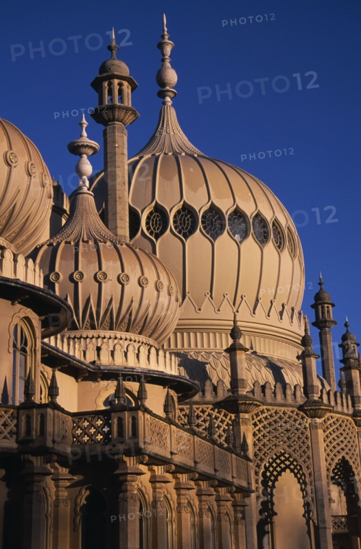 ENGLAND, Sussex, Brighton, Brighton Pavilion exterior section showing onion domes in evening light