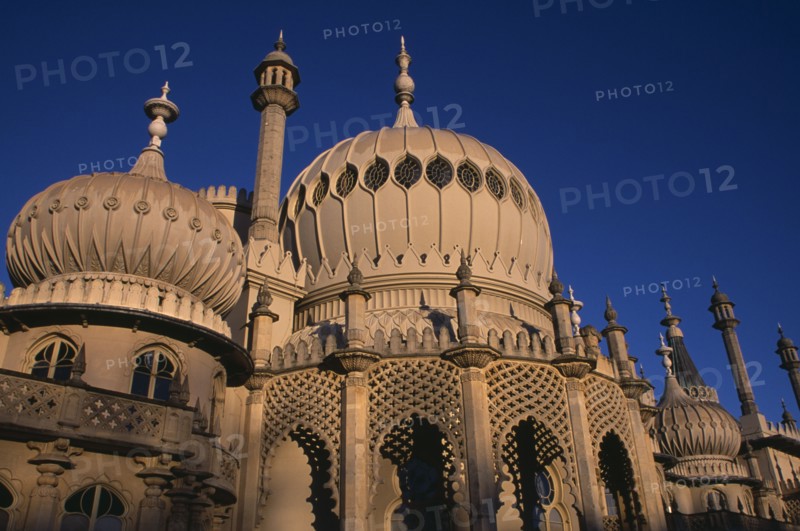 ENGLAND, East Sussex, Brighton, Brighton Pavilion exterior section showing onion domes in evening light
