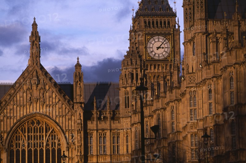 ENGLAND, London, Westminster. Exterior section of the Houses of Parliament and Big Ben seen in evening light