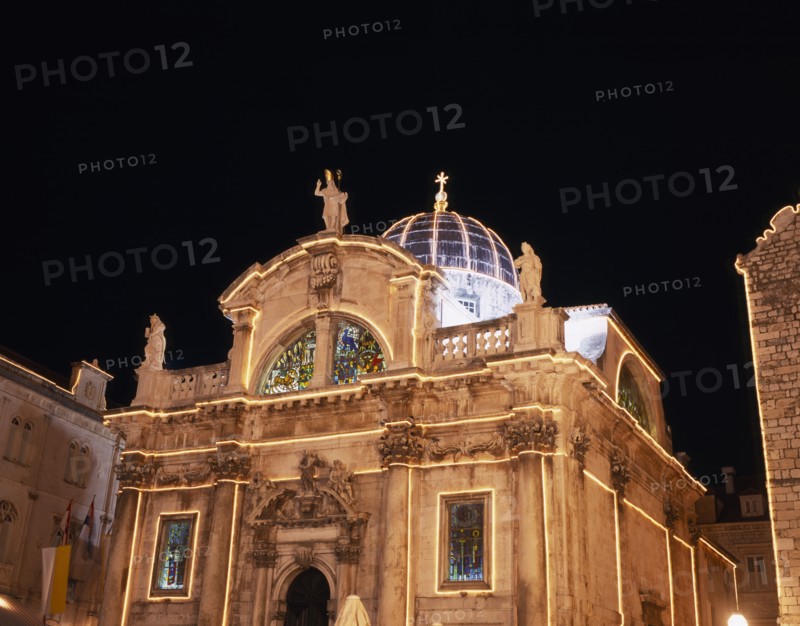 CROATIA, Dalmatia, Dubrovnik, Church of St Blaise Baroque facade illuminated at dusk