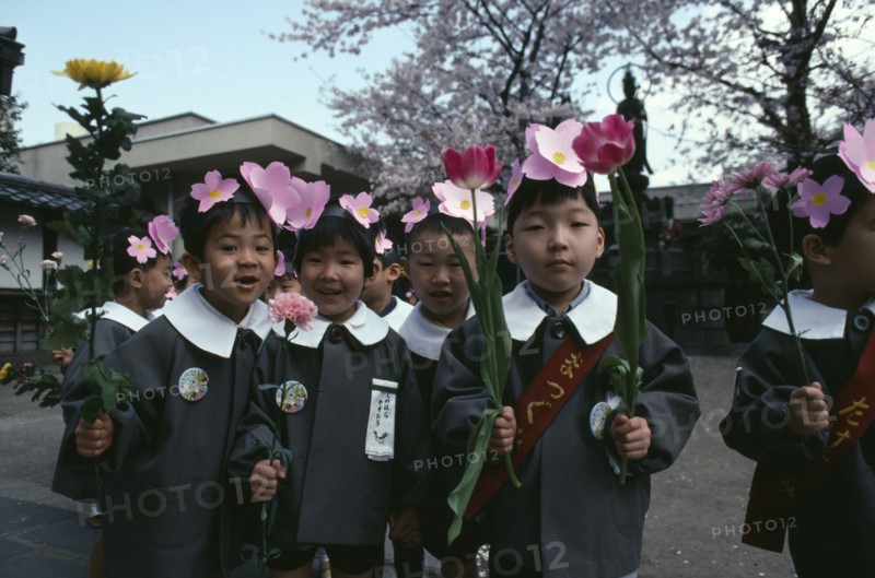 JAPAN, Honshu, Tokyo, Asakusa.  Nursery school children dressed for Hana Matsuri flower festival for Buddhas birthday.