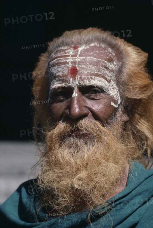 INDIA, Tamil Nadu, Tiruchirappalli, Head and shoulders portrait of a sadhu or holy man.