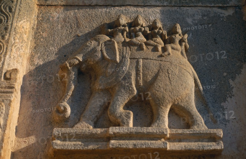 INDIA, Karnataka, Hampi, Bas relief carving of war elephant on Krishna temple.