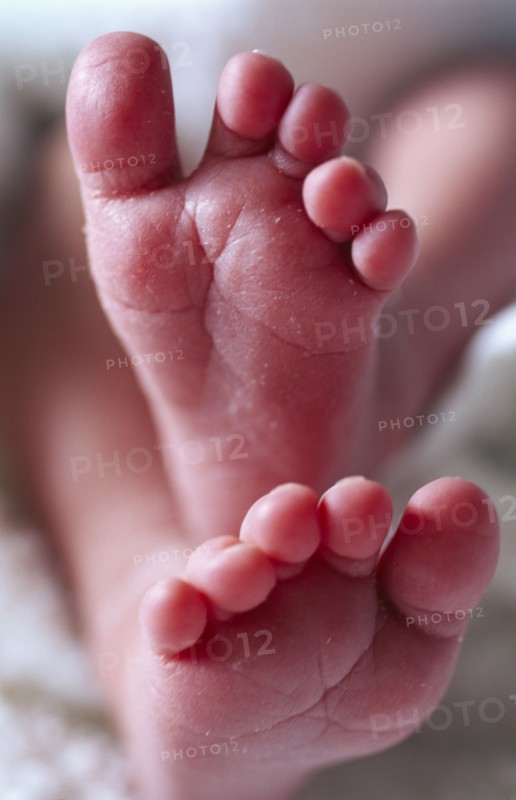 CHILDREN, Babies, Close up of the feet of a new born baby.