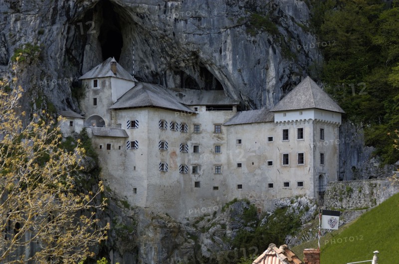 SLOVENIA, Predjama Castle, 16th Century castle built half way up 123M high cliff
