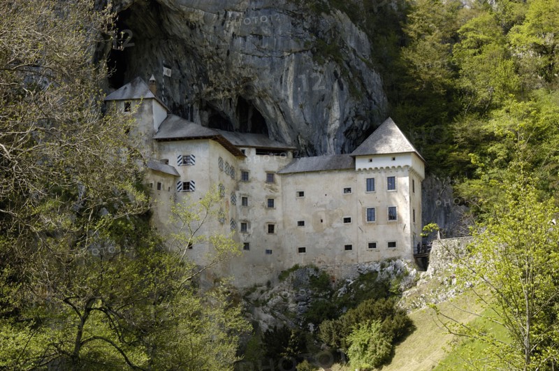 SLOVENIA, Predjama Castle, 16th Century castle built half way up 123M high cliff