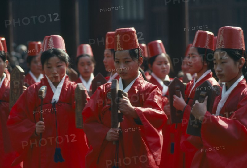 SOUTH KOREA, Seoul, Sung Kyon Kwan University.  Sukcheon ceremony to consecrate confucius.  Dancing by traditional eigtht rows of eight carrying carved and painted rattles.