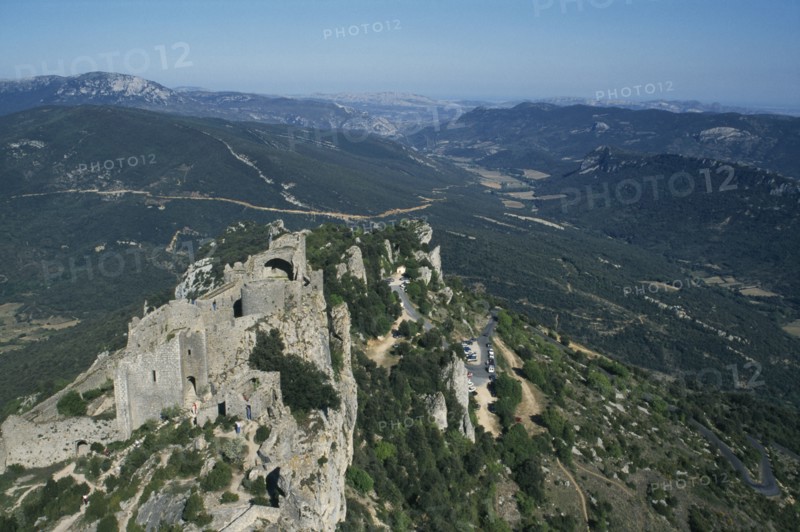 FRANCE, Languedoc Roussillon, Aude, Peyrepertuse Cathar Castle.  Ruined fortifications of eleventh century castle on rocky hillside.