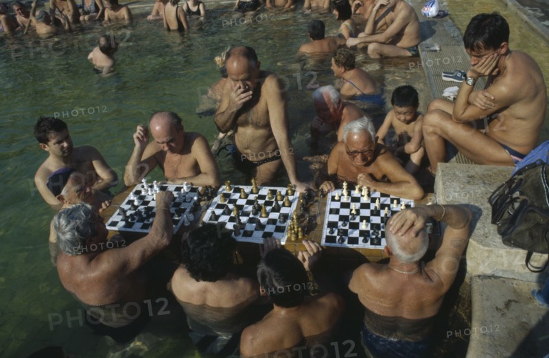 HUNGARY, Budapest, Szechenyi Furdo.  Chess players in thermal baths of spa.