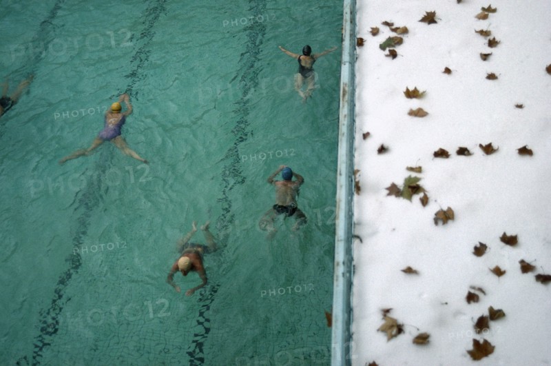 HUNGARY, Budapest, People swimming lengths in Luca thermal baths.