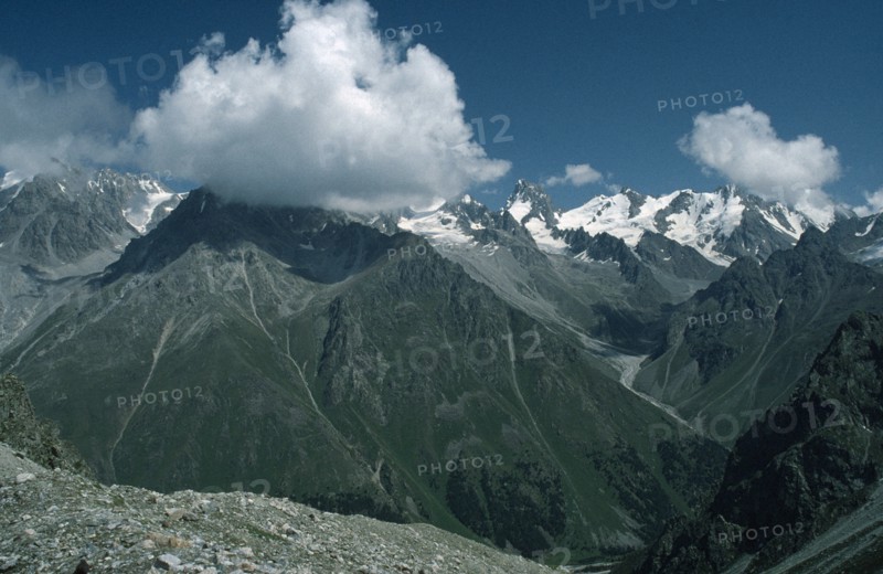 RUSSIA, Central Caucasus, Mount Ullutau, Cloud over mountain peak and the Adyrsu Valley