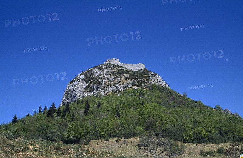 FRANCE, Languedoc Roussillon, Aude, Ruins of eleventh century Peyrepetuse Cathar Castle on top of rocky hillside.