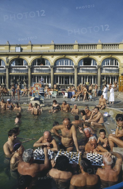 HUNGARY, Budapest, Szechenyi Furdo.  Chess players in thermal baths of spa.