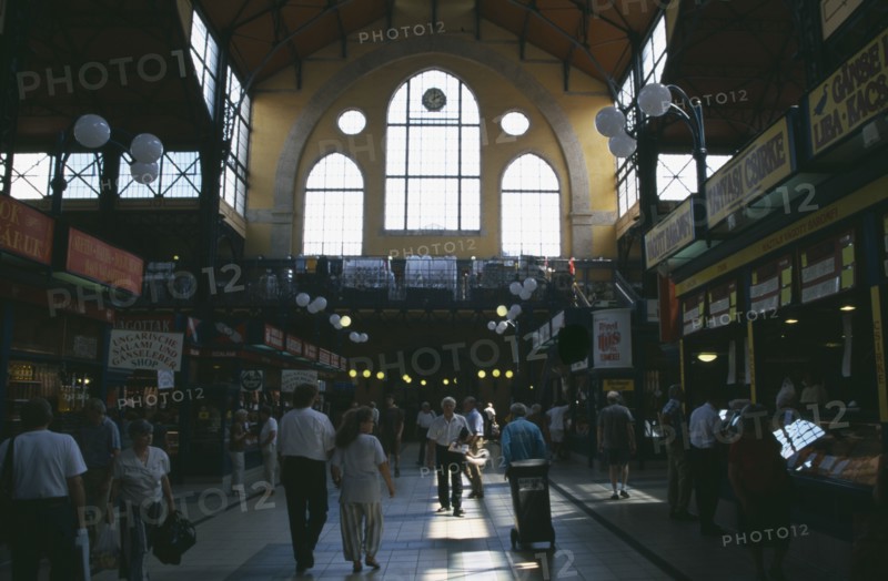 HUNGARY, Budapest, Shoppers in hall of Central Market.