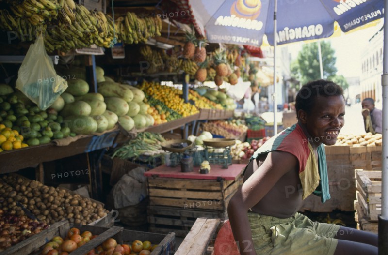 DJIBOUTI, Market, Man at his stall in the fruit market