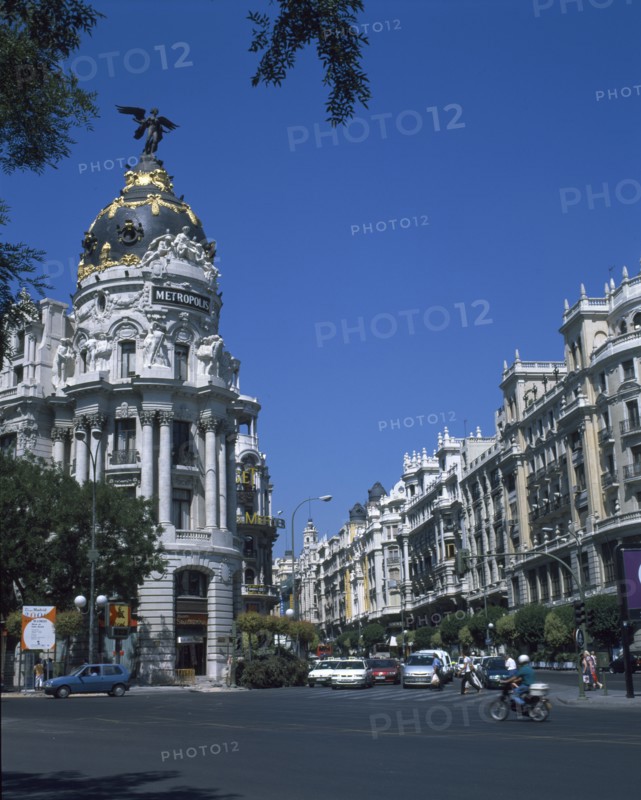 SPAIN, Madrid State, Madrid, Alcala Grand Via Junction. View over road and traffic towards the Metropolis building.
