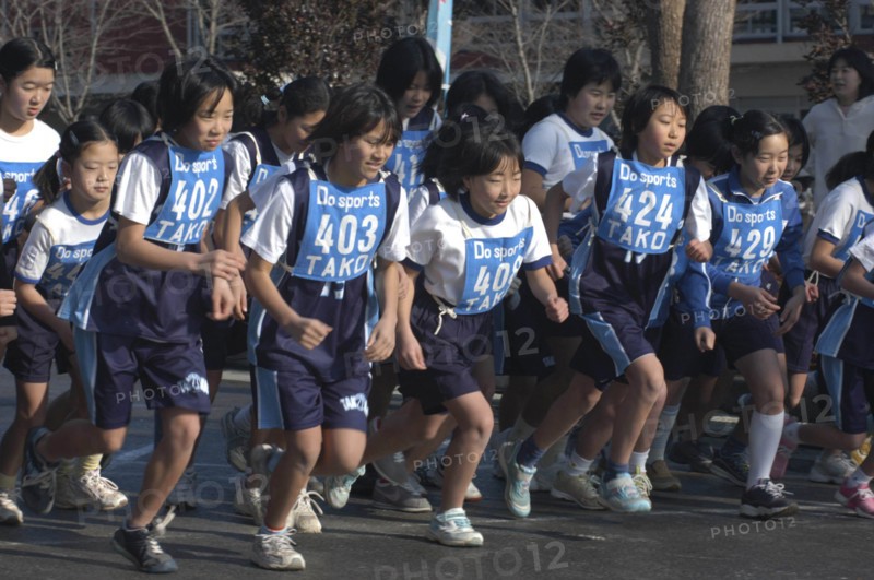 JAPAN, Chiba, Tako, 11-12 year old girls starting a 2 kilometer race which is part of the towns fitness festival