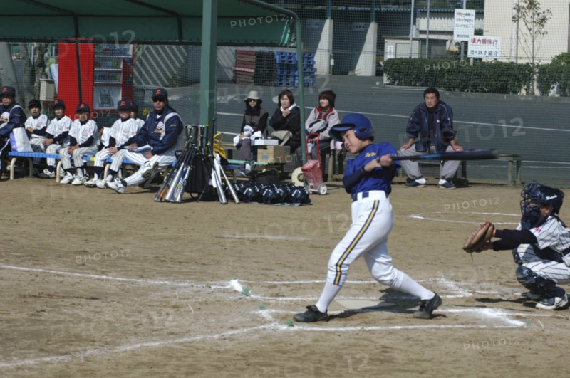 JAPAN, Chiba, Tako, "Captain Toshiki Hagiwara, 12 year old 6th grader,  watches the ball go for Toujou Shonen Yakyu Club, little league baseball "