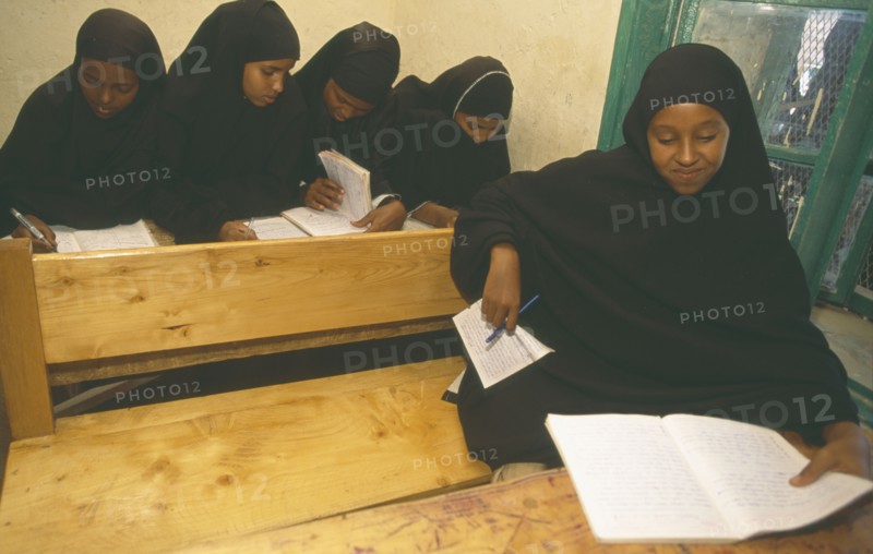 SOMALILAND, Hargeisa, Ali Osman Primary School.  Girls at desks in classroom.