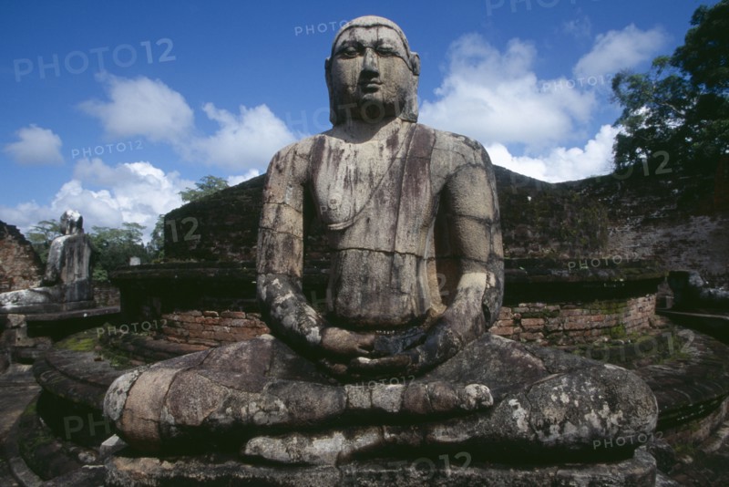 SRI LANKA, Polonnaruwa, The Vatadage. Seated Buddha statue within the quadrangle