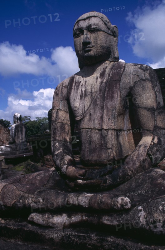 SRI LANKA, Polonnaruwa, The Vatadage. Seated Buddha statue within the quadrangle