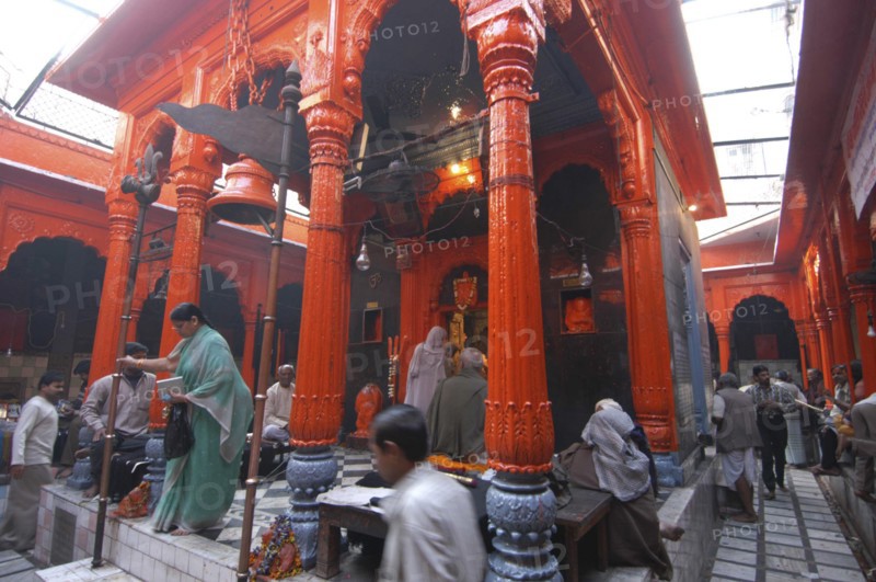 INDIA, Uttar Pradesh, Varanasi, Kala Bhairava Temple. Inner temple with worshippers