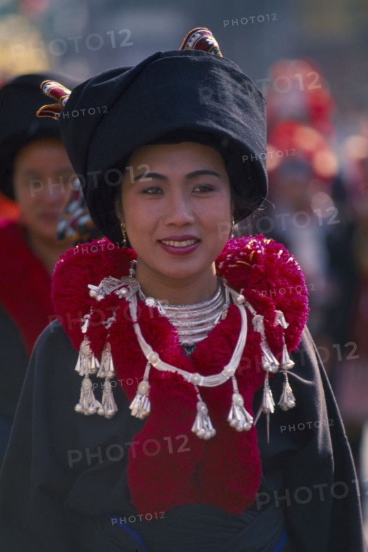 THAILAND, Chiang Mai, Portrait of a young Iu Mien woman in traditional Iu Mien attire