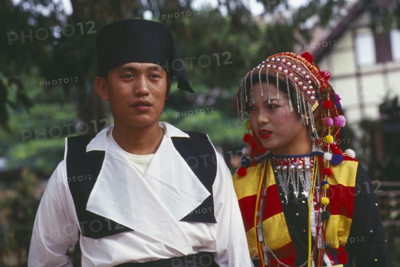 MYANMAR, Kachin State, Manhkring, Lisu man and woman in traditional Lisu attire of the Myitkyina area