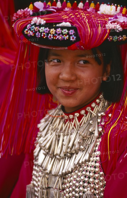 THAILAND, Chiang Rai Province, Huai Khrai, Portrait of a young Lisu girl in her New Year finery