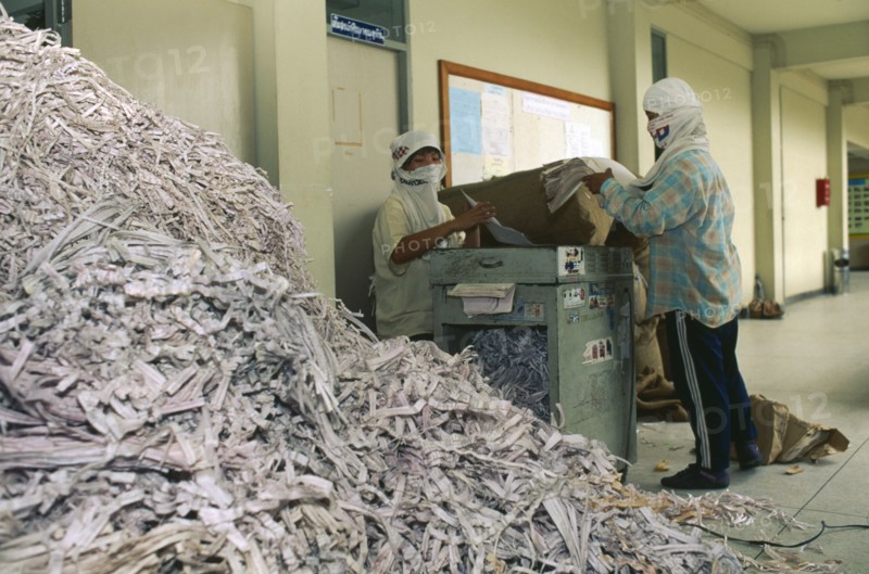 THAILAND, Chiang Mai Province, Women shredding paper at Mae Jo University