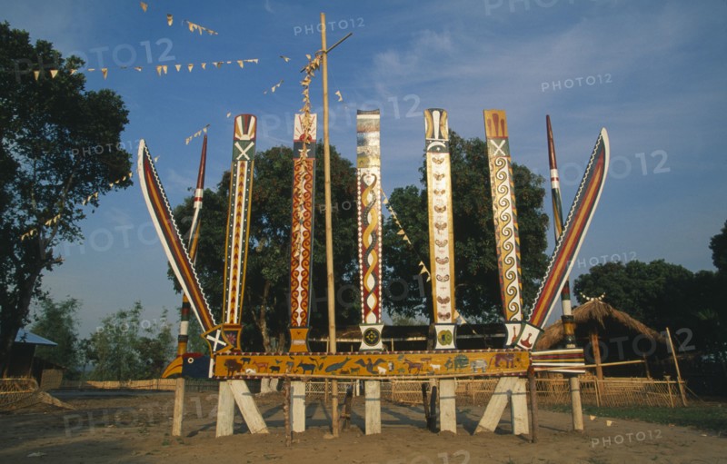MYANMAR, Kachin State, Myitkyina, Jinghpaw Manao posts at Manao grounds
