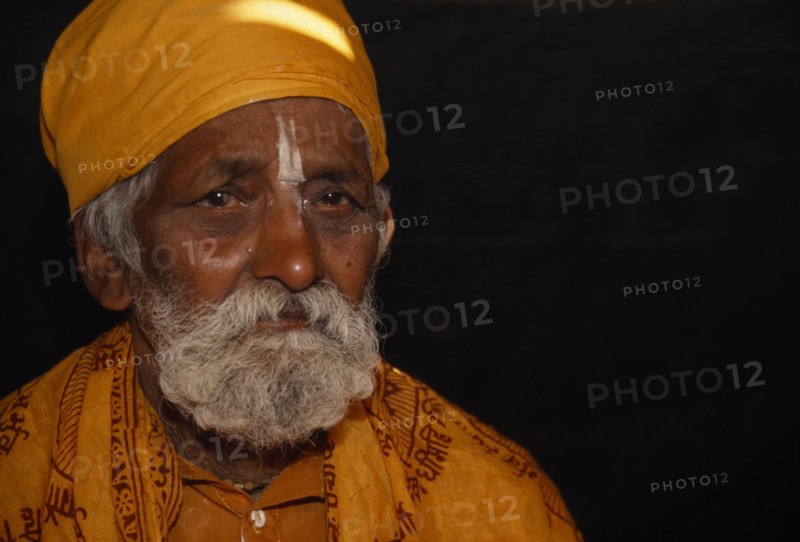 MYANMAR, Religion, Hinduism, Head and shoulders portrait of Hindu priest during festival at the confluence of the Ayeyarawady north of Myitkyina in upper Myanmar.