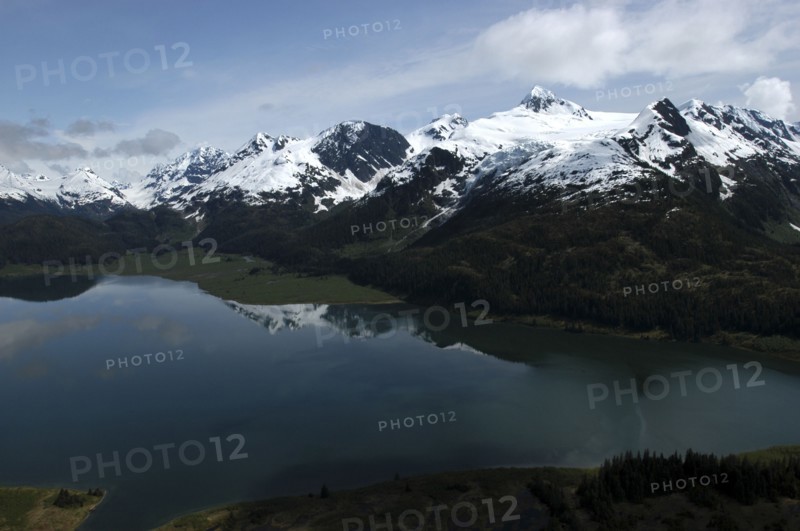 USA, Alaska, Prince William Sound, View over waters toward snow capped mountain peaks