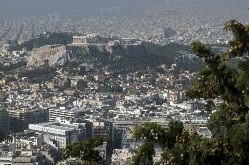 GREECE, Athens, Aerial view over the city toward the Acropolis