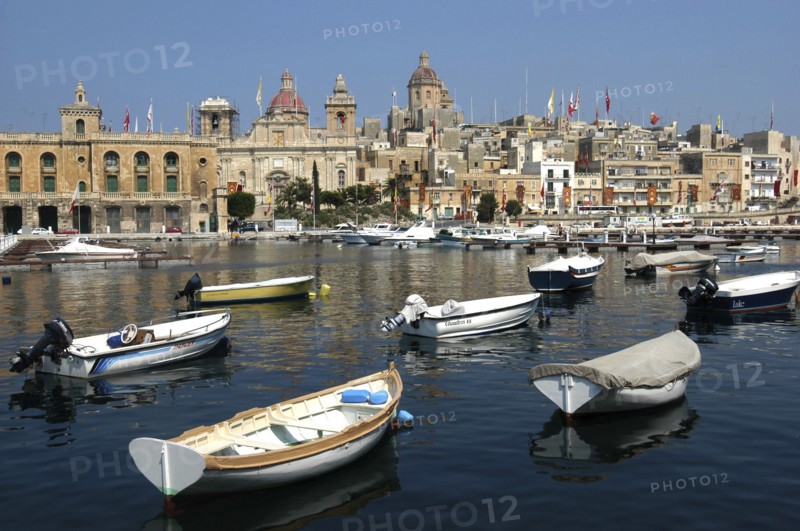 MALTA, Vittoriosa, View over moored boats toward waterfront architecture of the town
