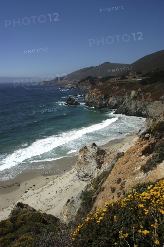 USA, California, Big Sur, Pacific Coast Highway. View over sandy bay and rocky coastline