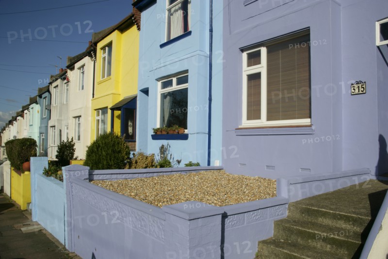 ENGLAND, East Sussex, Brighton, Brightly coloured terraced houses on Bear Road