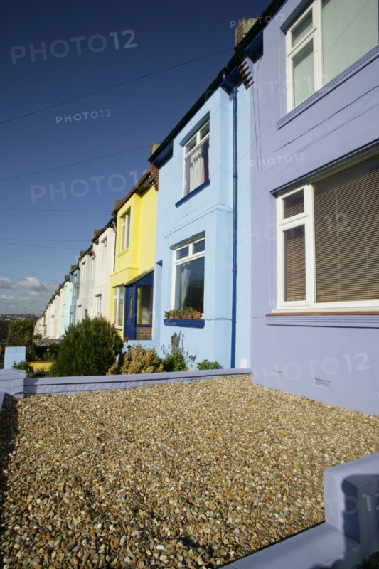 ENGLAND, East Sussex, Brighton, Brightly coloured terraced houses on Bear Road