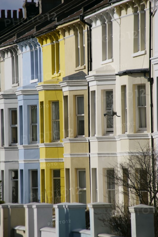 ENGLAND, East Sussex, Brighton, Brightly coloured terraced houses in Hanover area