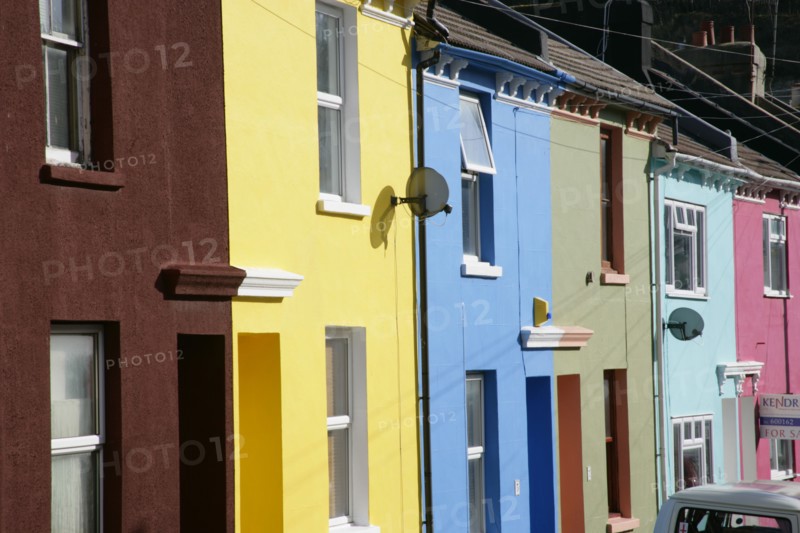 ENGLAND, East Sussex, Brighton, Brightly coloured terraced houses in Kemp Town