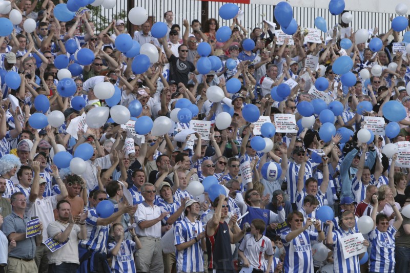 SPORT, Crowds, Brighton and Hove Albion supporters at the County Ground Swindon