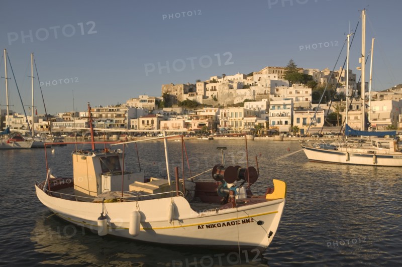 GREECE, Cyclades, Naxos, Hora. View of the waterfront in evening light.