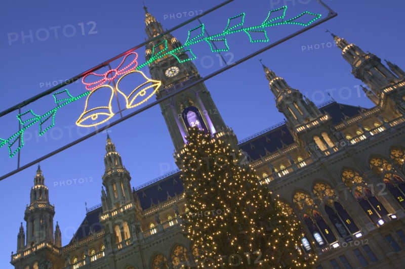 AUSTRIA, Vienna, Christmas lights and tree in front of the Rathaus during the Christmas Market.
