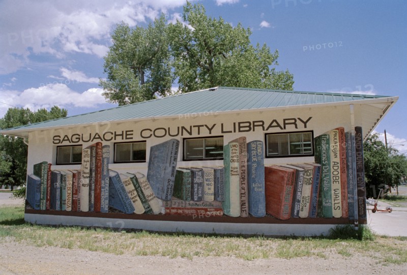 USA, Colorado, Saguache County, Library building with books painted on the exterior walls
