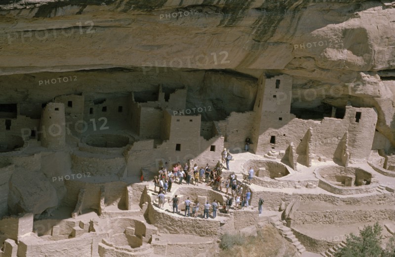 USA, Colorado, Mesa Verde Nat Park, View of the Cliff Palace which is the largest Anasazi cliff dwelling with tourist group