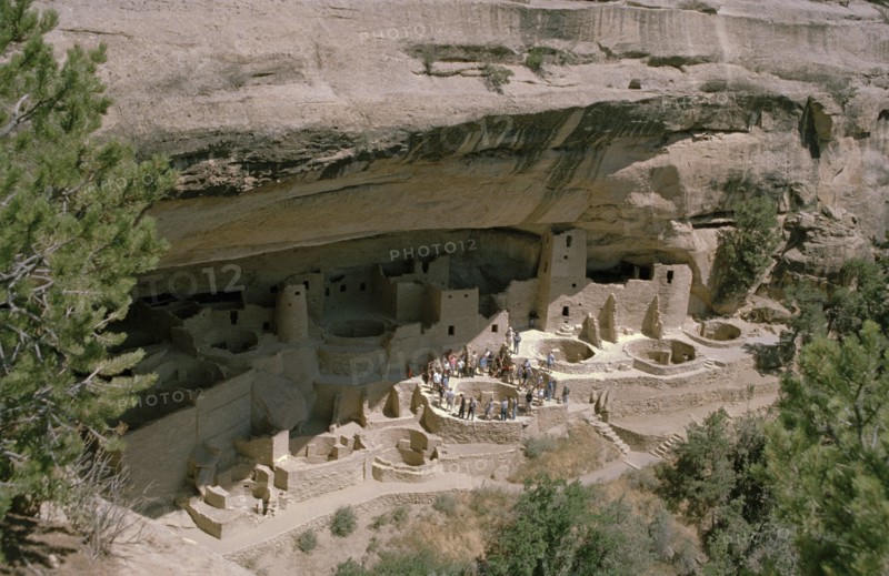 USA, Colorado, Mesa Verde Nat Park, View of the Cliff Palace which is the largest Anasazi cliff dwelling with tourist group