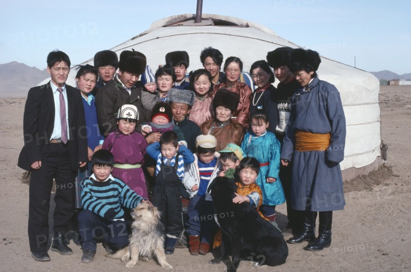 MONGOLIA, Ulaan Baatar, Three generations of one family outside their yurt.
